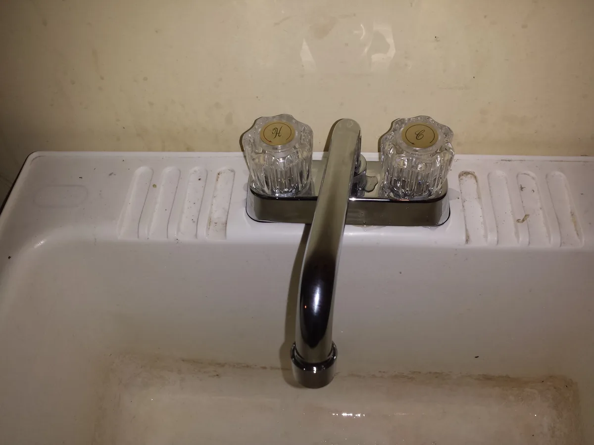 Laundry tub faucet repair and replacement — Midtown Plumbing
